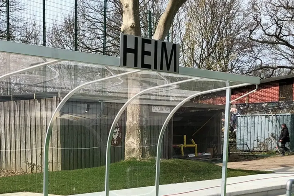 Schild "Heim" für Spieler- und Betreuerkabinen